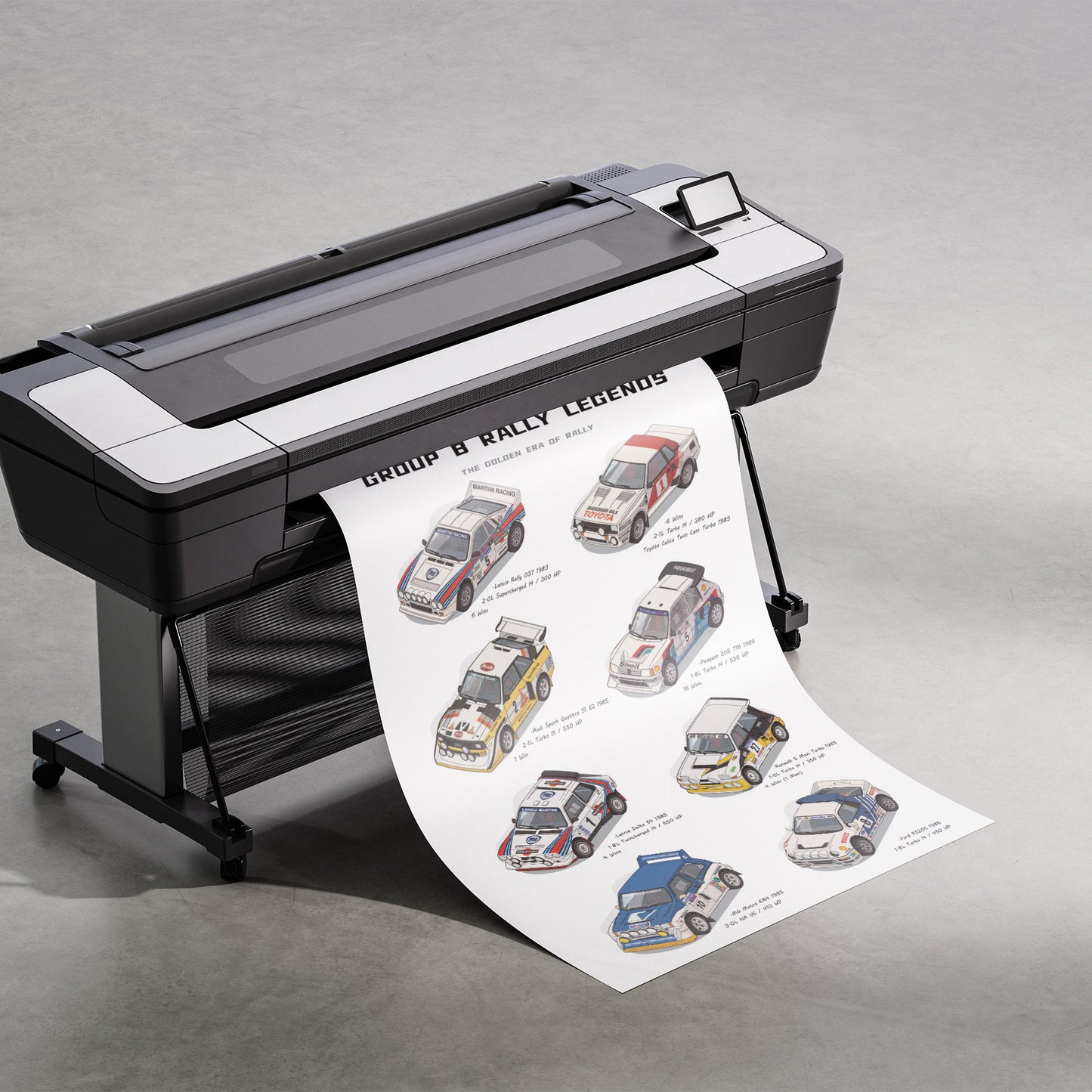 A large black and white wide-format printer on a stand, printing a long sheet featuring illustrated rally cars and the text 'Group B Rally Legends' on a gray studio floor.