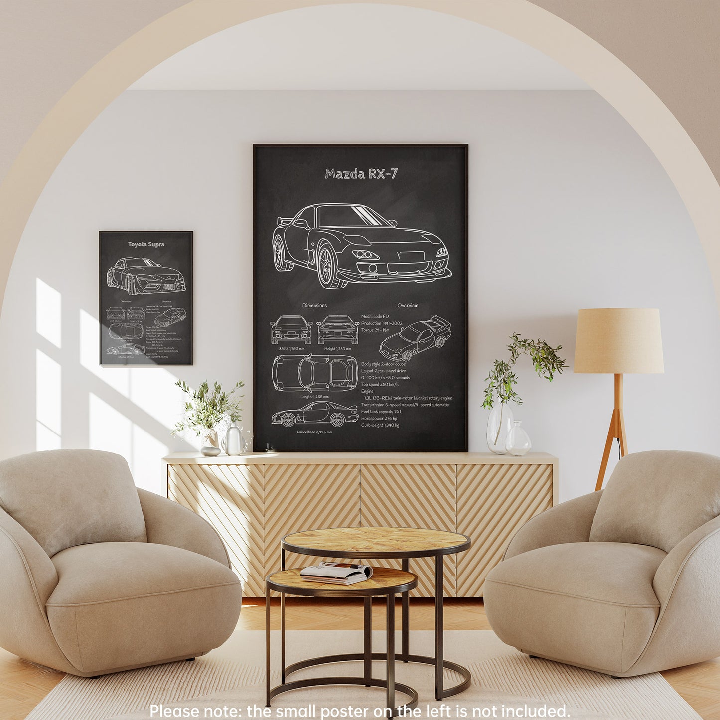 Living room with beige armchairs, a coffee table, and a large framed diagram of a Mazda RX-7 on the wall.