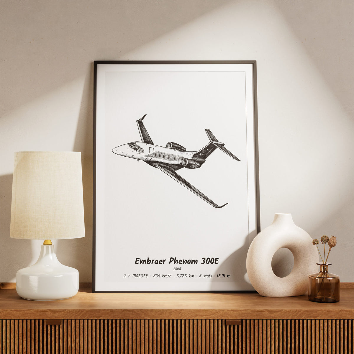 Framed Phenom 300E Print on a Shelf