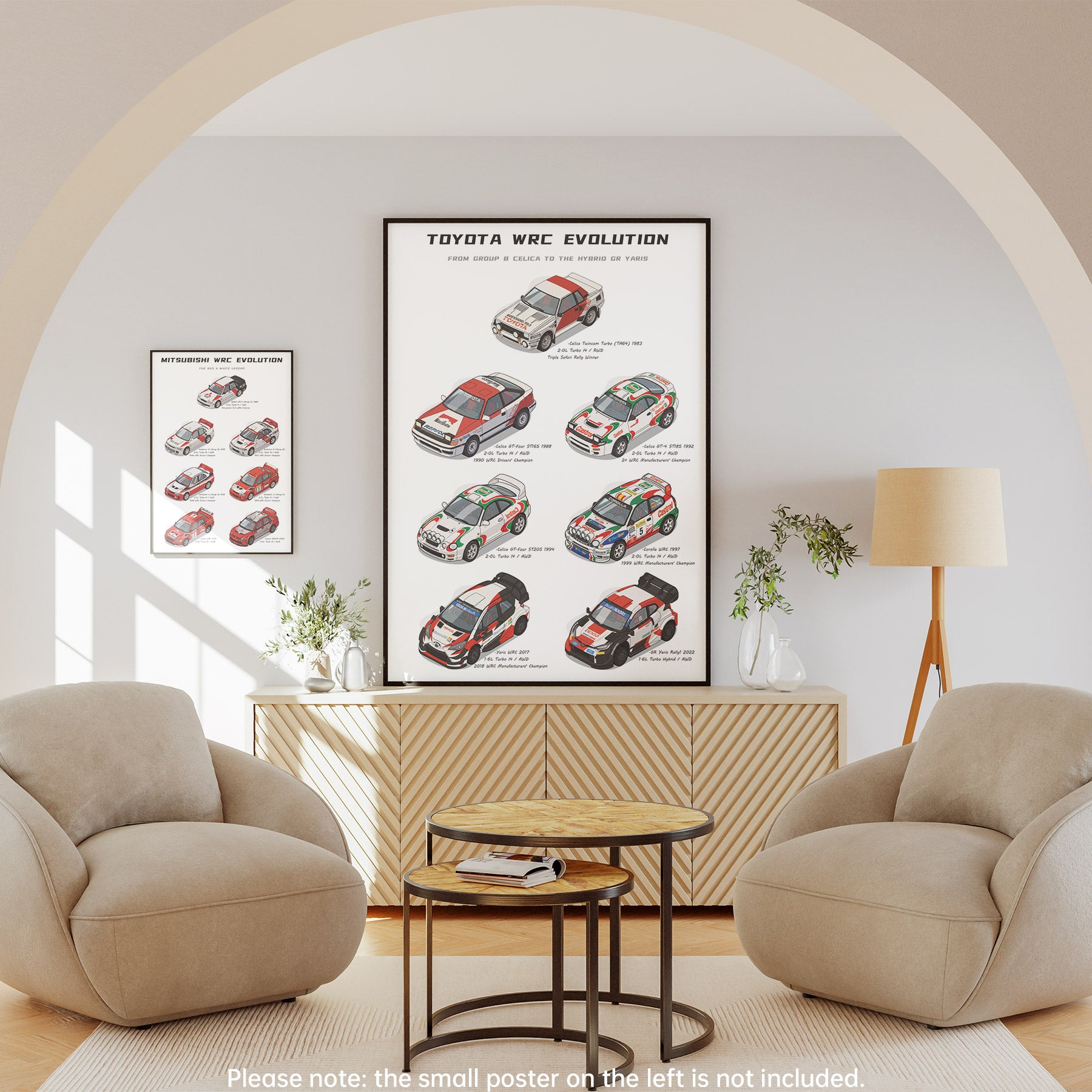 A framed wall poster titled 'Toyota WRC Evolution' hangs above a wooden cabinet in a styled living room with two beige armchairs, a small round table, and a floor lamp. The poster shows illustrated rally cars and text, and a smaller version of the poster is visible on the left wall.